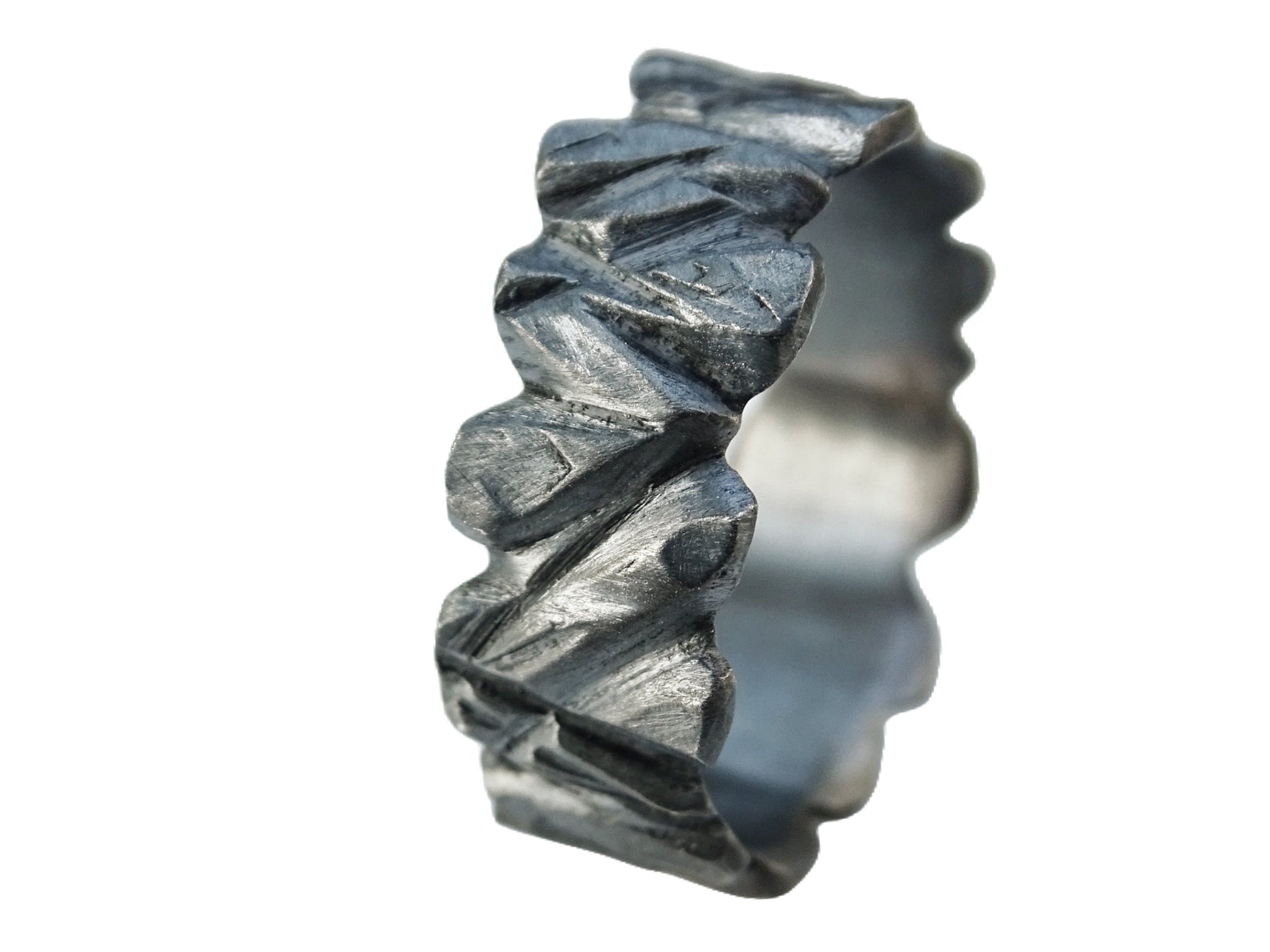 carved black oxidized sterling silver wedding ring with textured hammered design for men and women