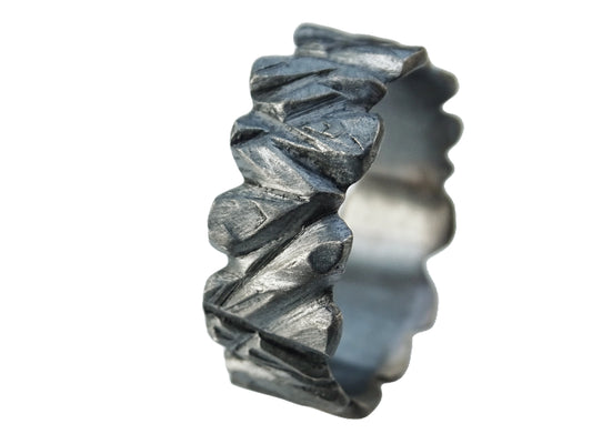 carved black oxidized sterling silver wedding ring with textured hammered design for men and women