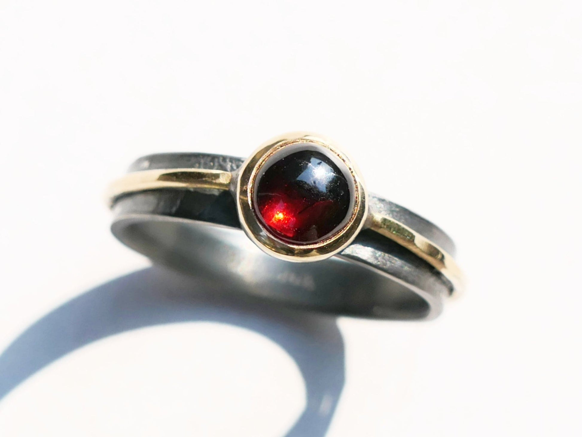 mixed metal garnet ring