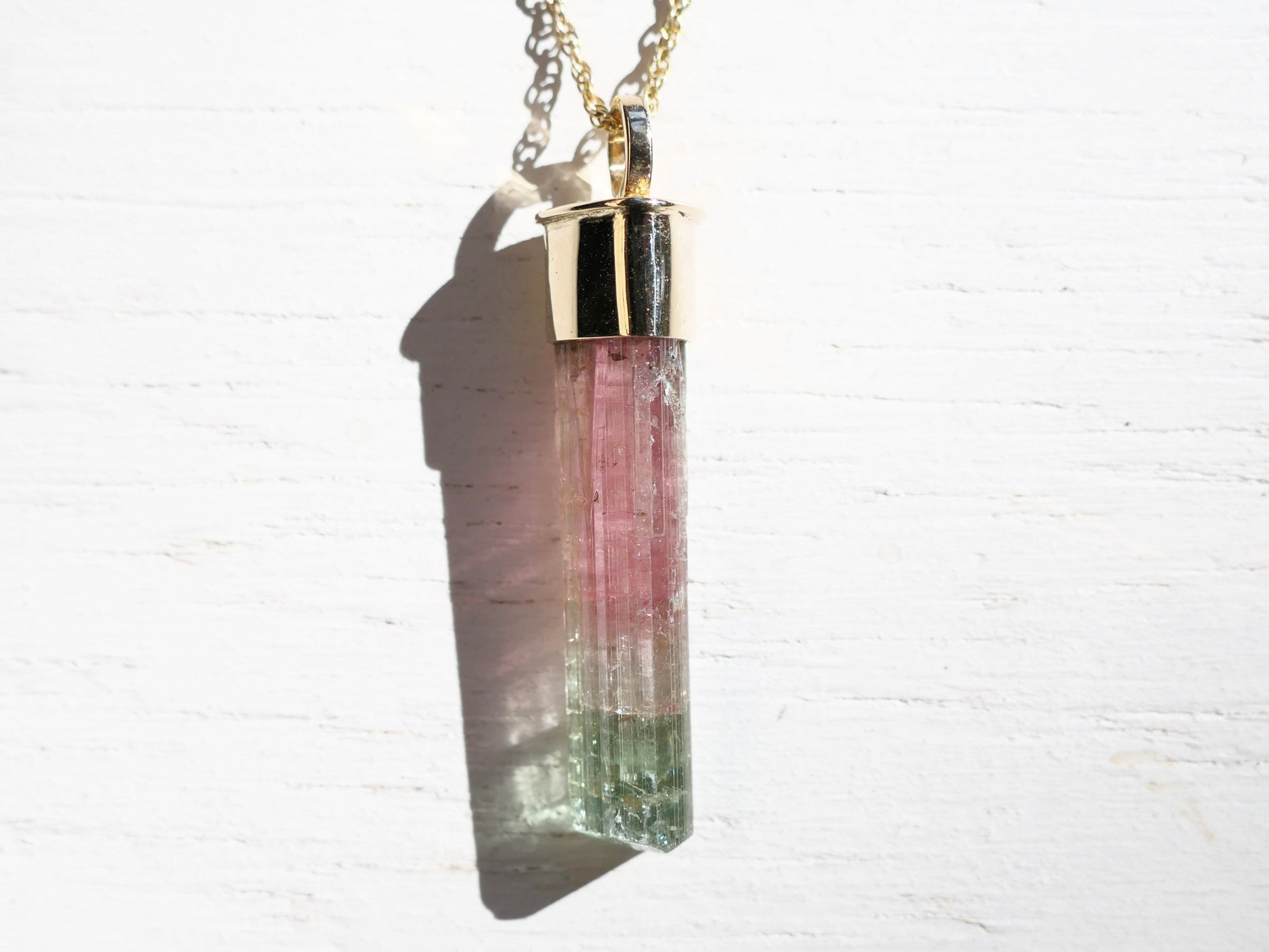 Watermelon tourmaline crystal pendant in solid 14k gold with a gold chain