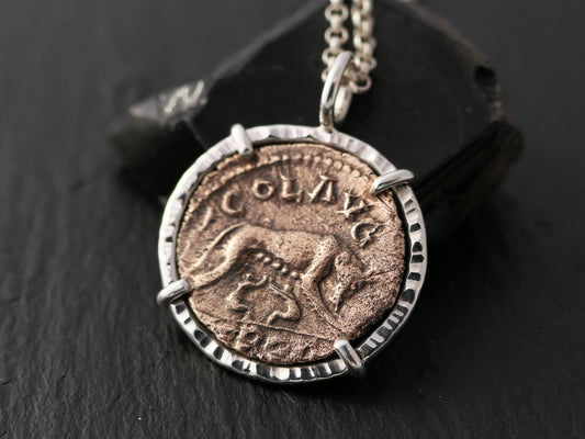 Ancient Roman she-wolf coin pendant in sterling silver setting on chain