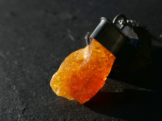 Natural Mexican fire opal pendant with black oxidized sterling silver setting and chain