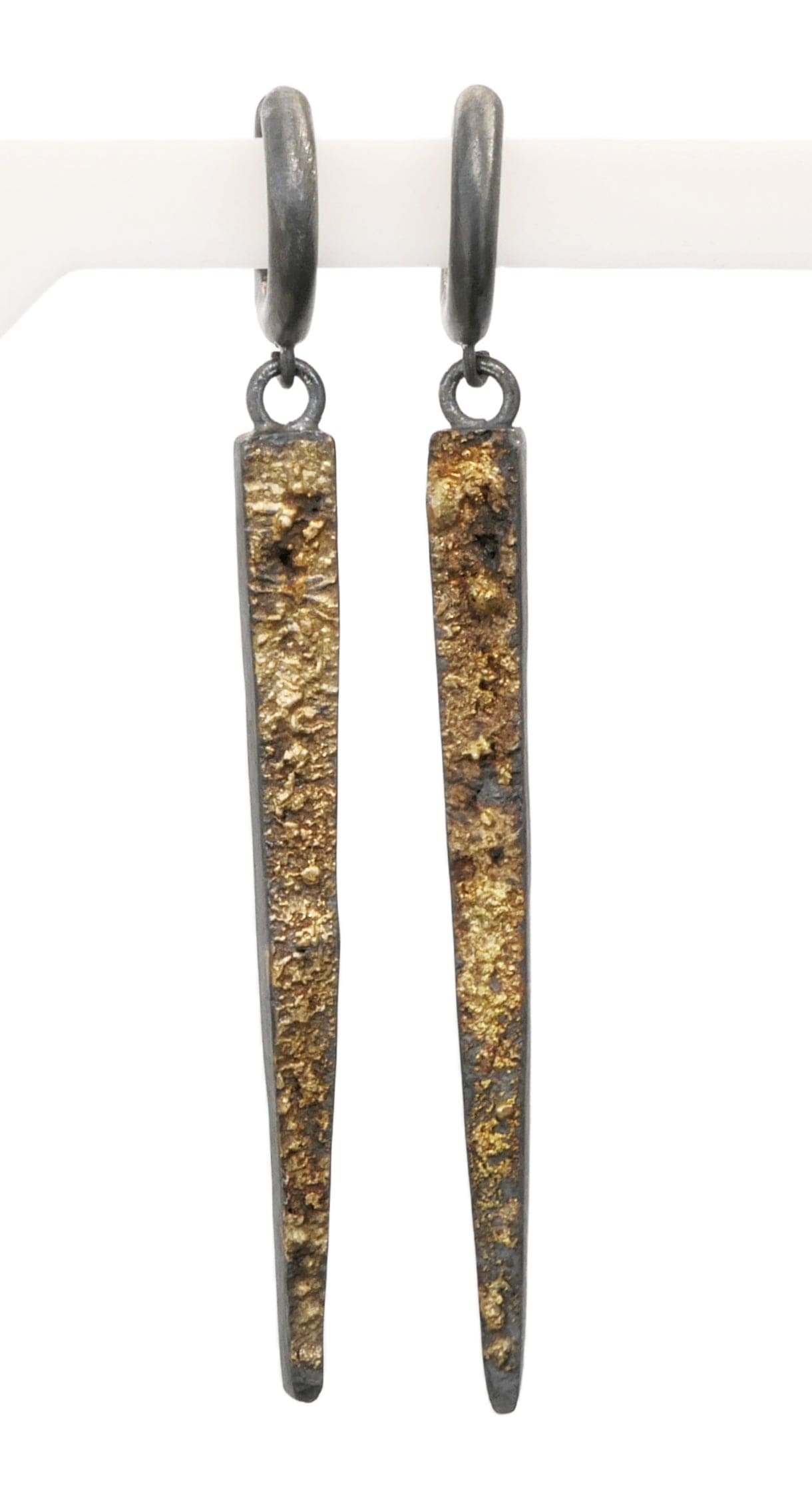 black spike earrings gold