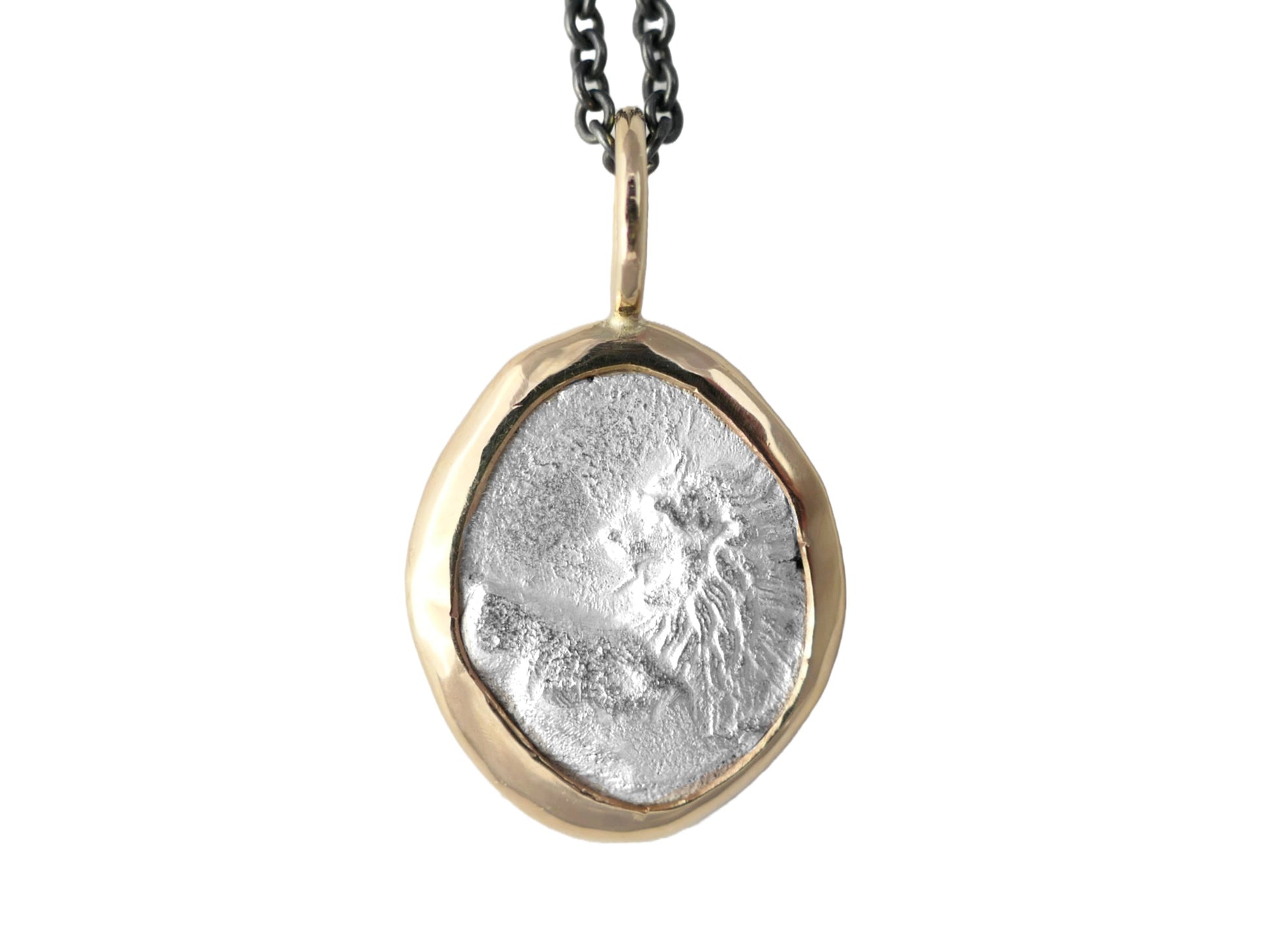 Ancient Greek silver coin pendant from Chersonesos in solid 14k yellow gold setting on black sterling silver chain.