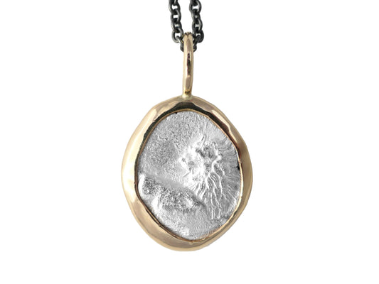 Ancient Greek silver coin pendant from Chersonesos in solid 14k yellow gold setting on black sterling silver chain.