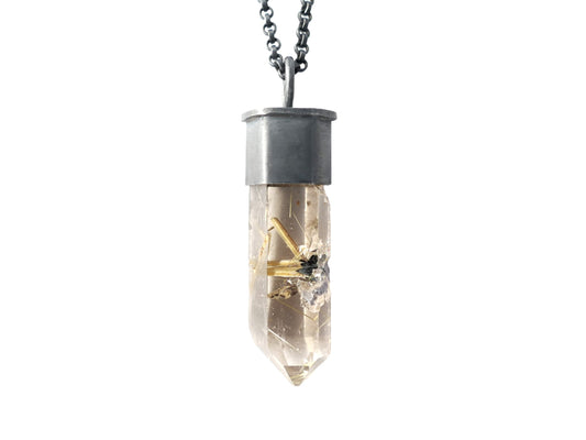 star rutile in quartz pendant