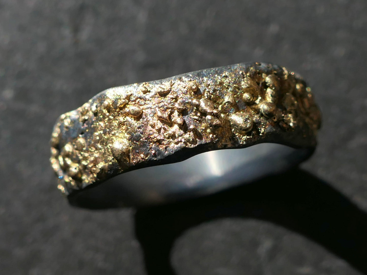 unique men's ring in black sterling silver with fused 14k gold