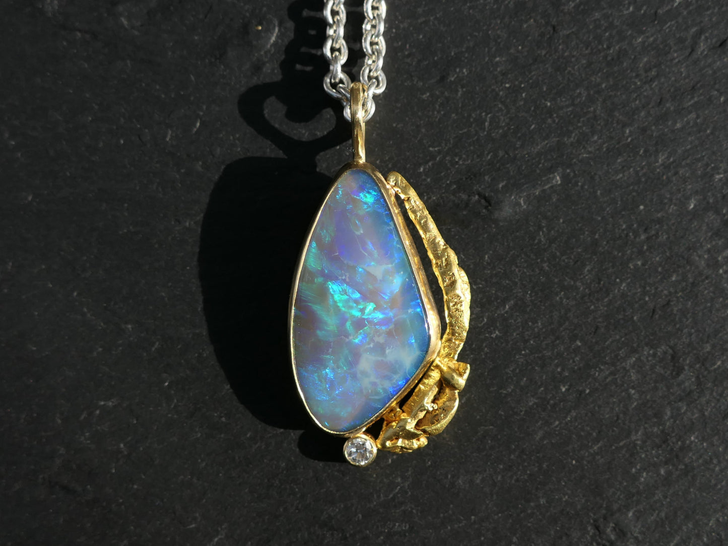 semi black Australian opal pendant with diamond