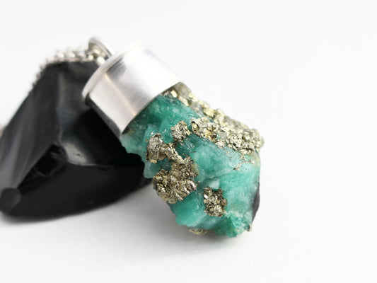 uncut Colombian emerald in matrix