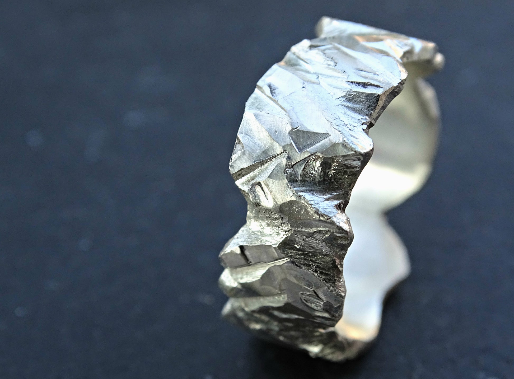 black wedding ring, light silver finish