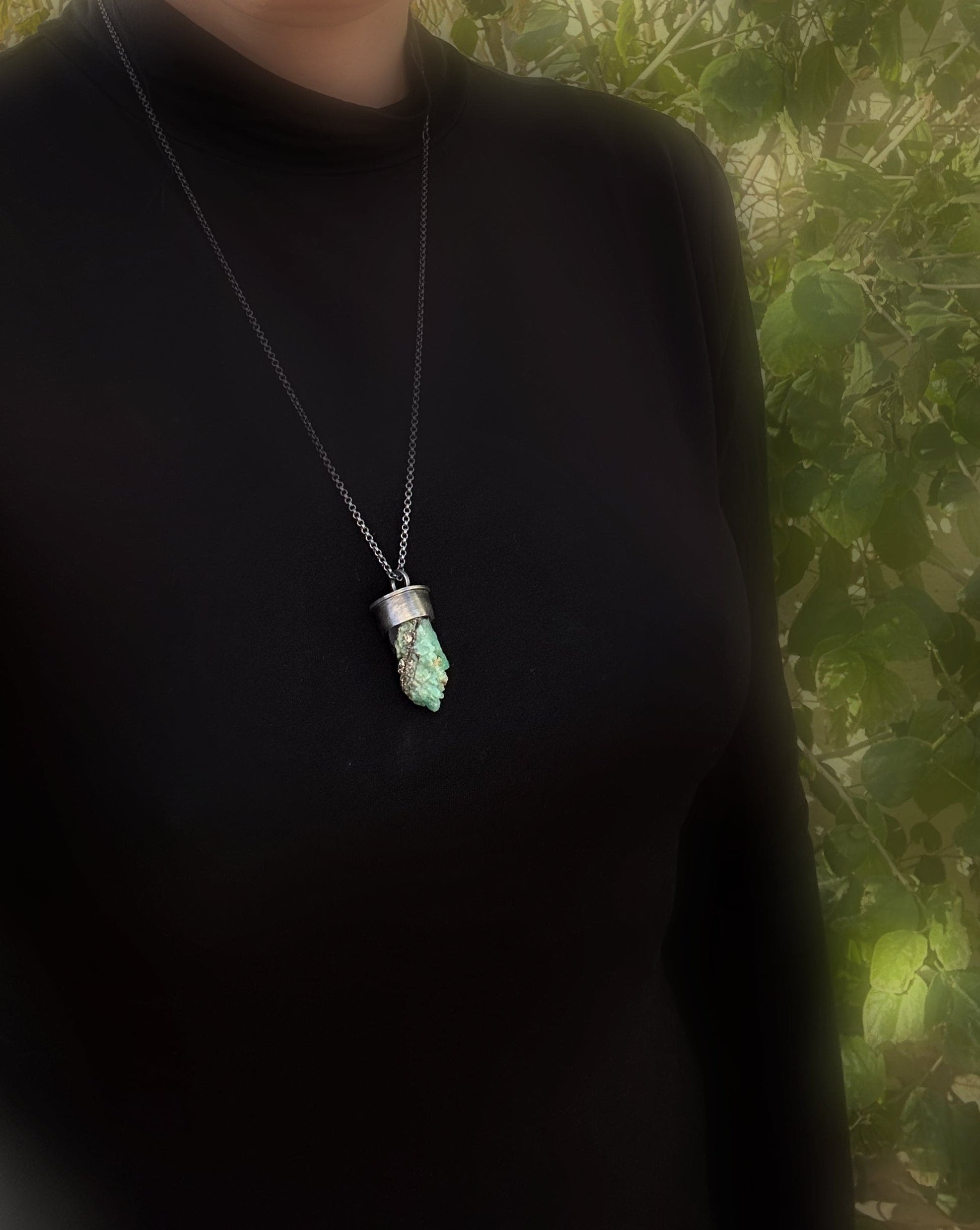 uncut emerald pendant