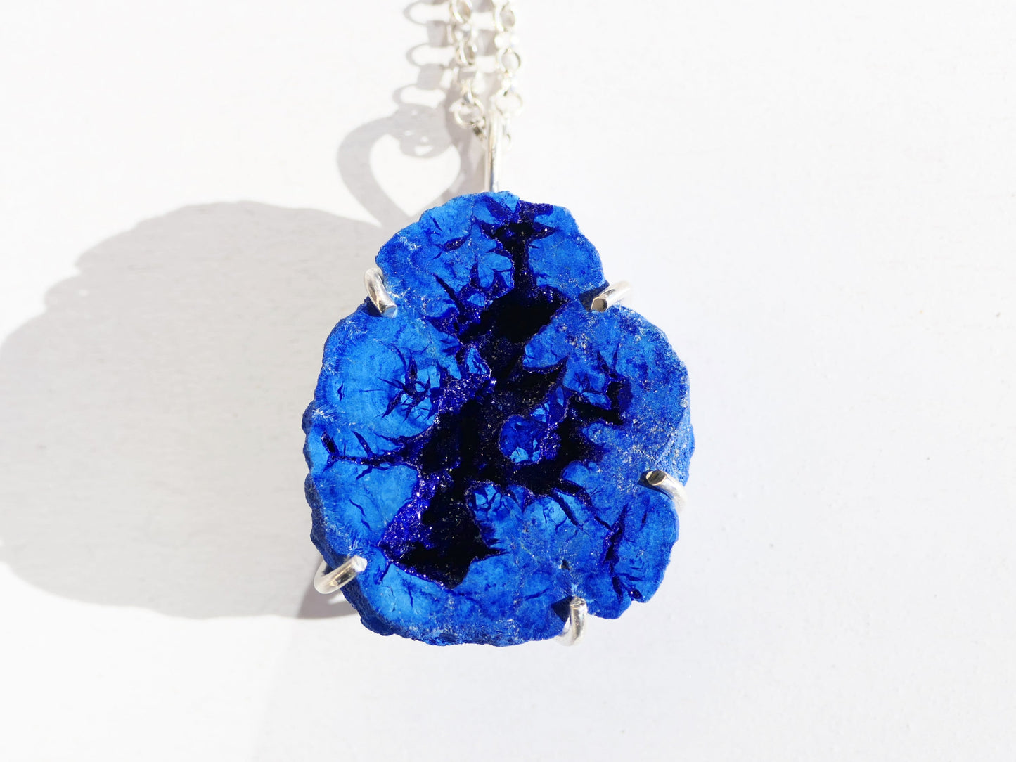 big azurite pendant in sterling silver prong setting with druzy center