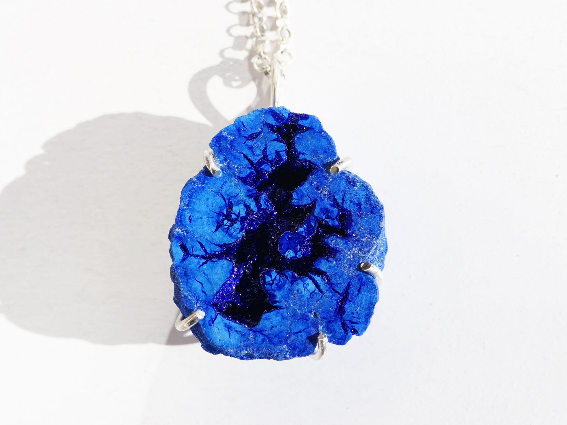 big azurite pendant in sterling silver prong setting with druzy center