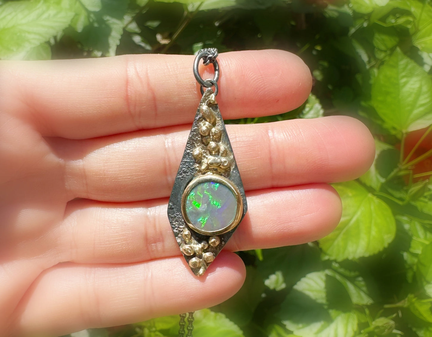 black opal pendant in sterling silver with 14k gold granules