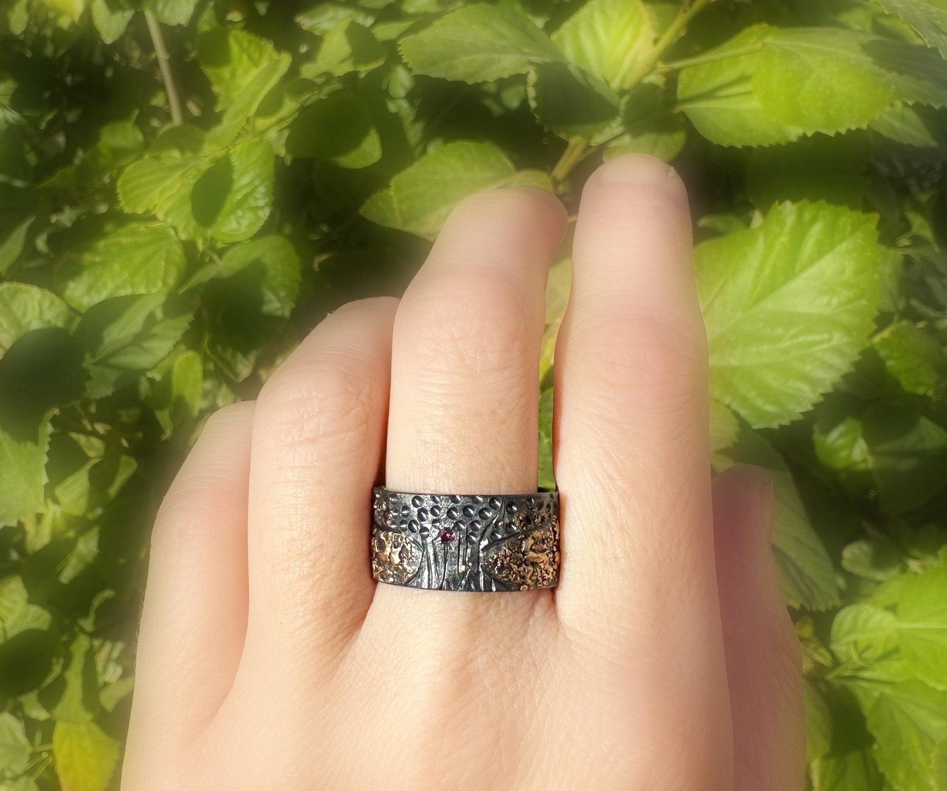 Men's unique tree of life ring with rubies, handmade in 14k gold and sterling silver.