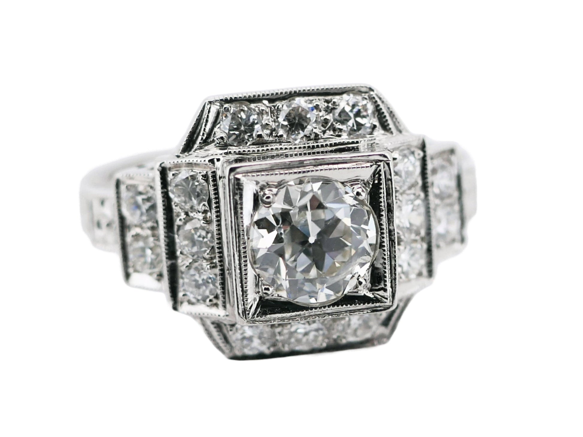 Antique Art Deco platinum diamond ring with central European cut diamond and surrounding smaller diamonds