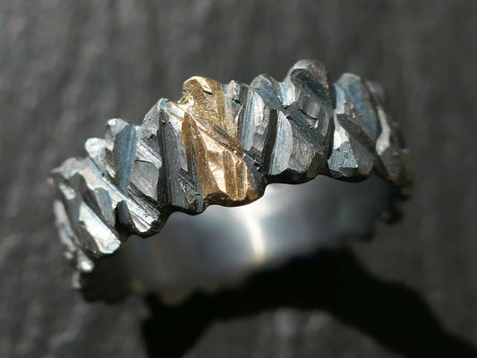 cool mens wedding ring with rugged hand carved sterling silver and solid gold center inlay