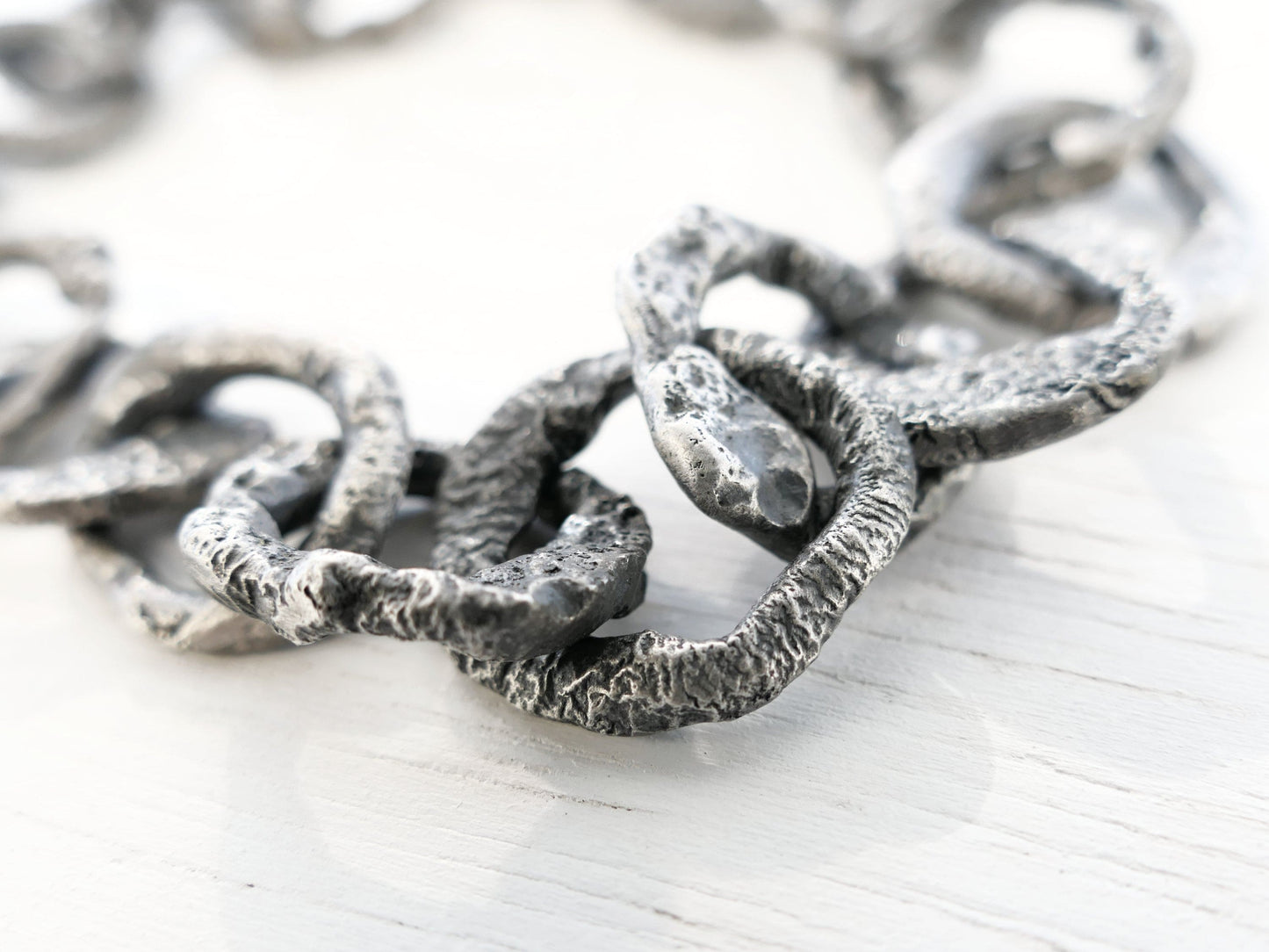 thick silver link bracelet