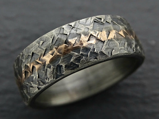 Handmade textured sterling silver wedding ring with center bronze inlay and hammered finish
