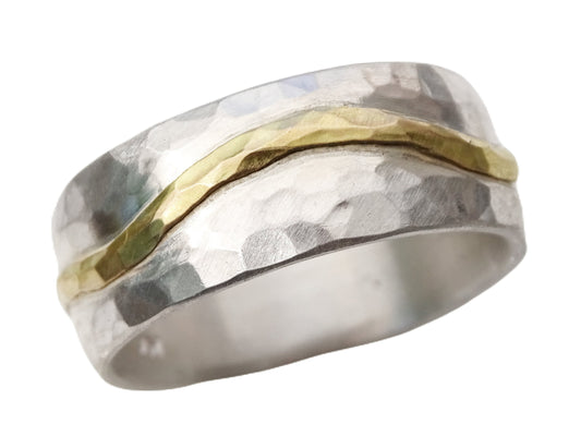 forged silver and gold mens wedding band with hammered texture and organic gold wave design