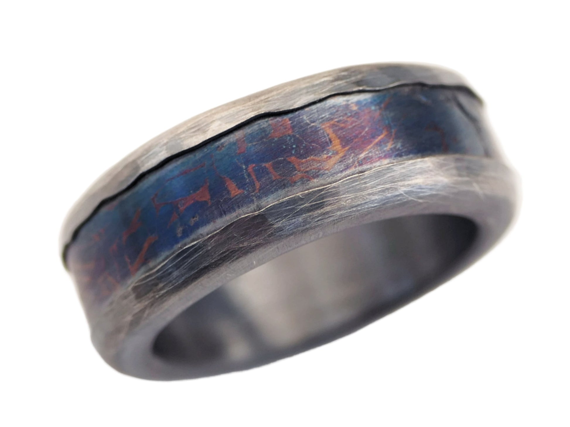 Sterling silver men's wedding band with blue-purple Muonionalusta meteorite inlay and unique Widmanstätten pattern