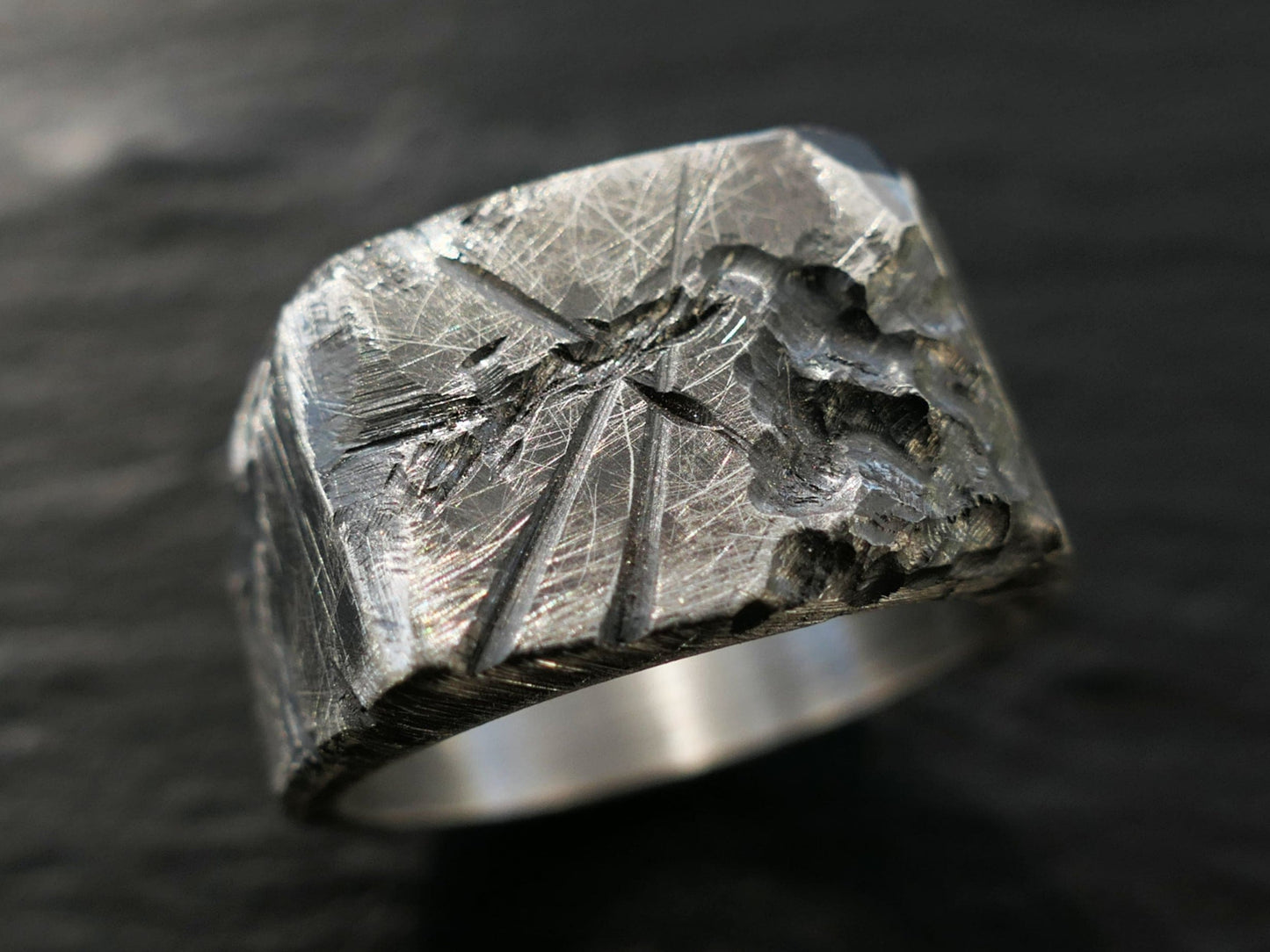 Rugged silver signet ring with a worn, textured rectangular plate made from solid sterling silver.