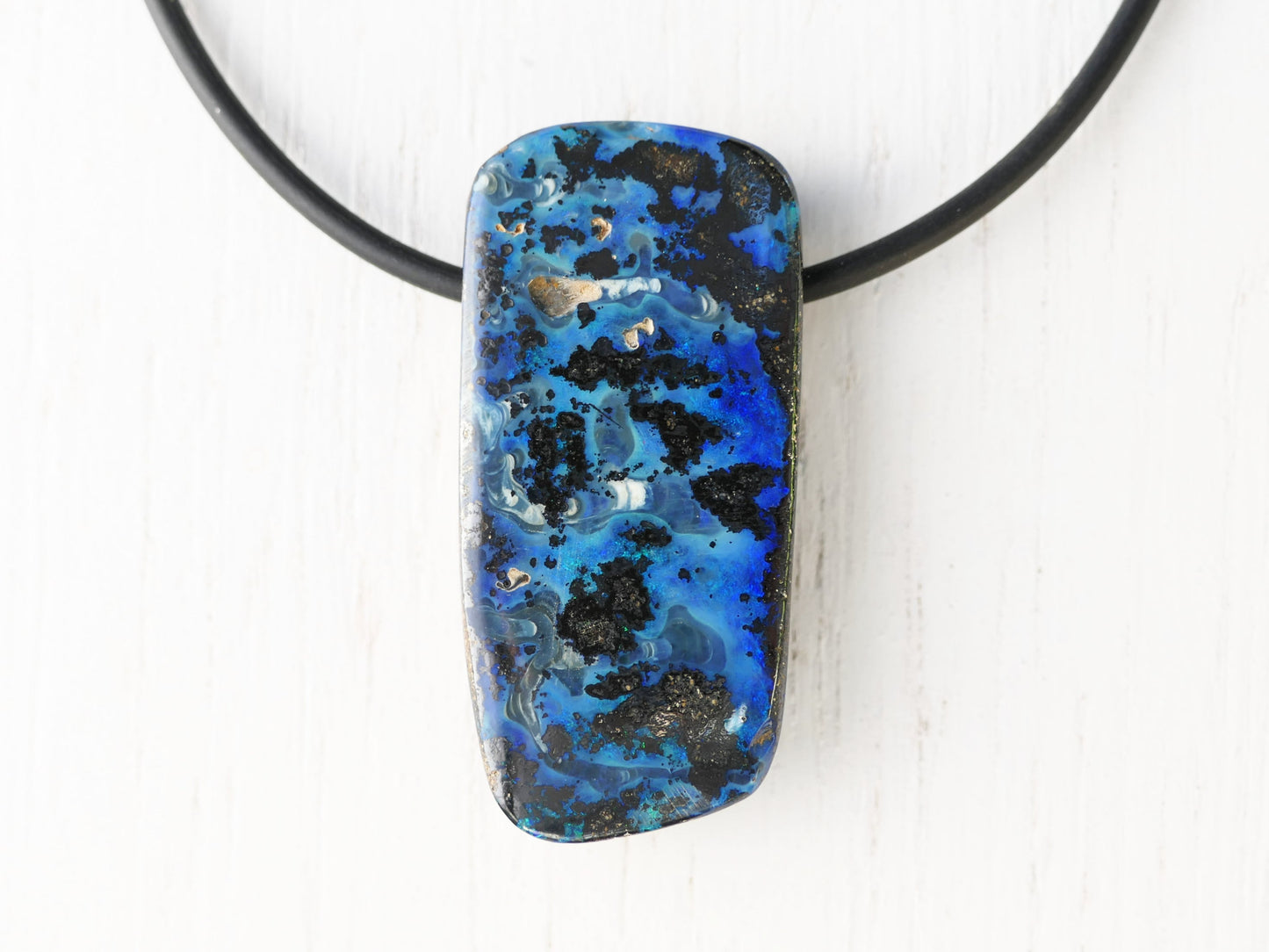 Large blue Australian boulder opal pendant with black neoprene cord and sterling silver clasp