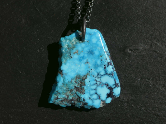 bright blue Kingman turquoise nugget pendant on black sterling silver chain
