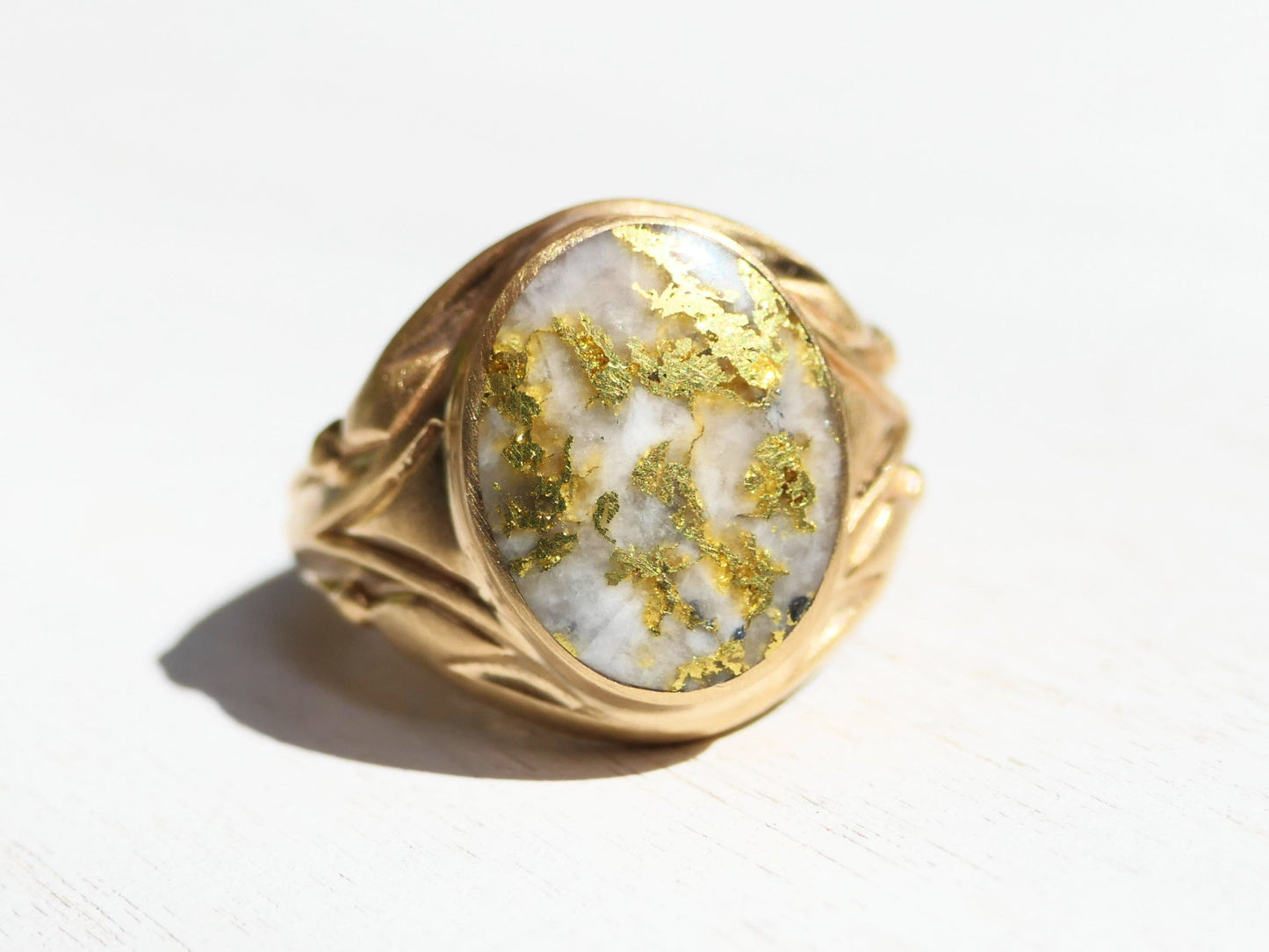 big gold in quartz ring