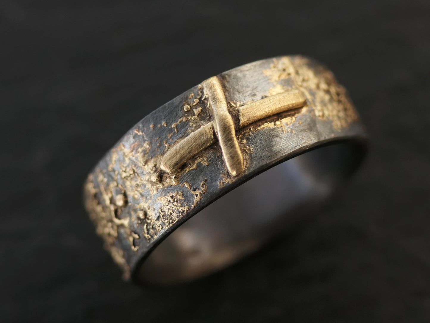 handmade sterling silver and 14k gold rune ring with oxidized black finish, viking wedding band