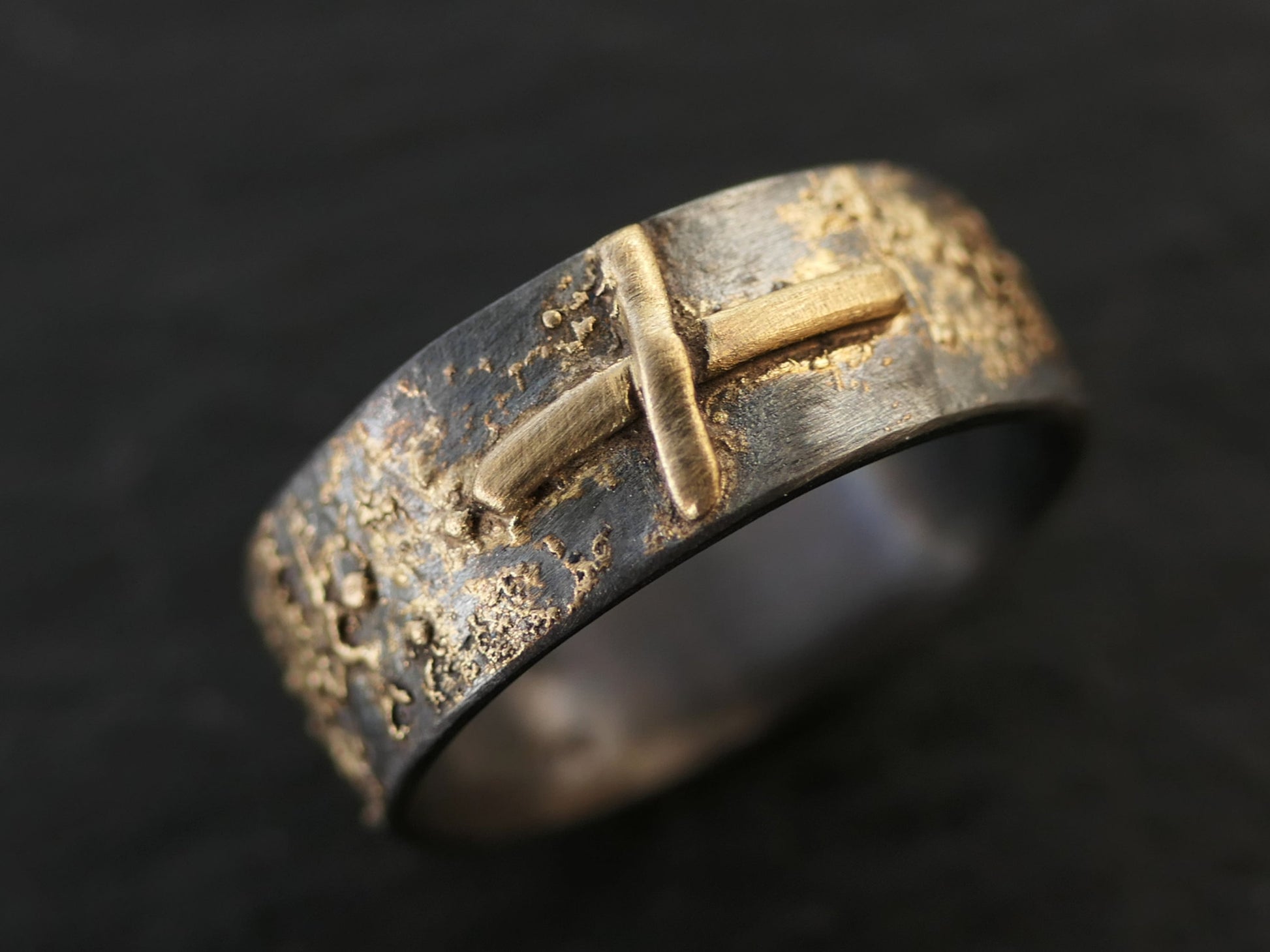handmade sterling silver and 14k gold rune ring with oxidized black finish, viking wedding band