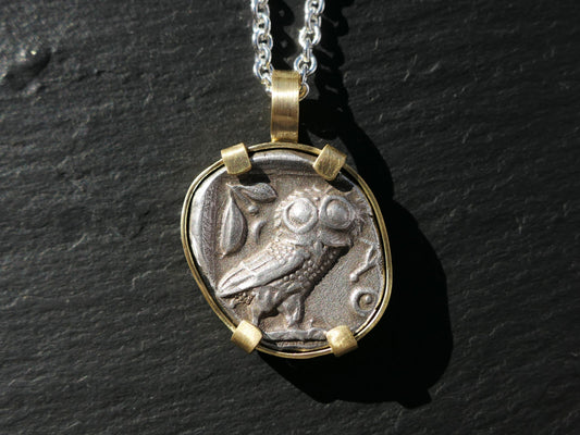 Ancient Owl of Athena coin necklace in 18k gold featuring authentic ancient Greek coin, silver chain, and minimalist gold setting.