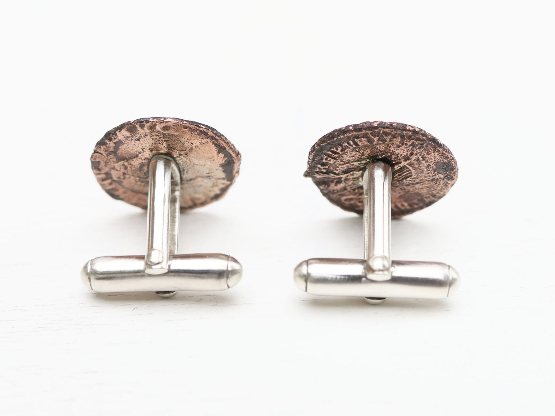 bronze cufflinks with sterling silver backs