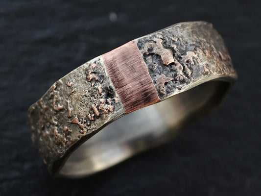 men's wedding ring with molten silver and copper design, rustic textured band with vivid color contrast