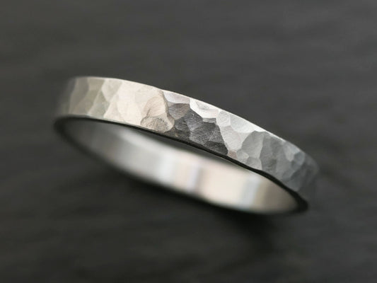 hammered solid 950 palladium wedding ring with brushed matte finish and organic edges