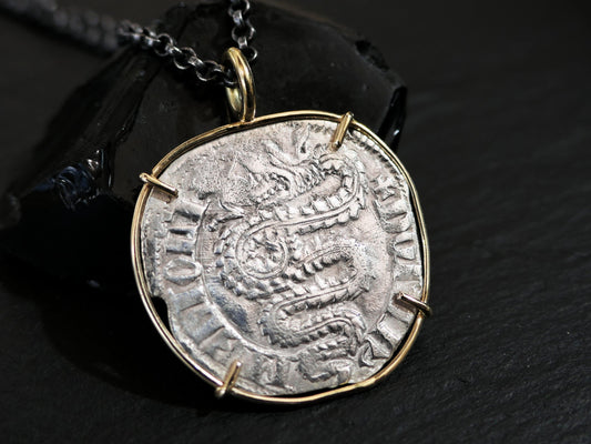Historic silver coin pendant with 14th century Italian dragon design set in 18k gold on black sterling silver chain