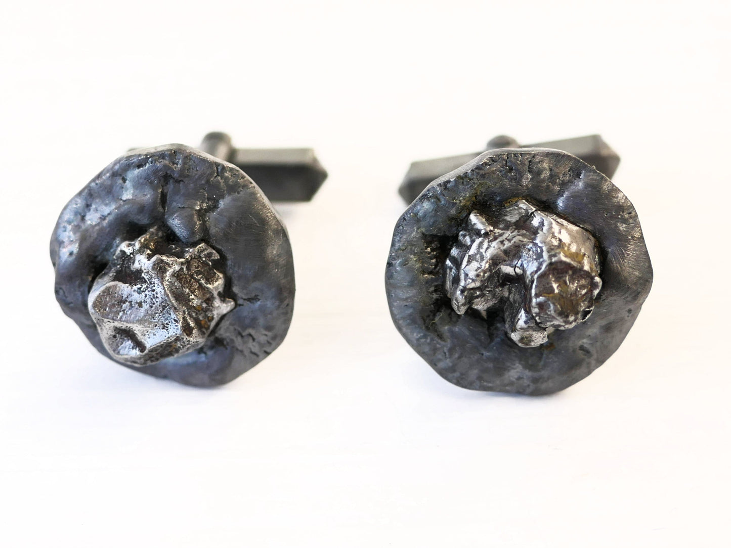 Dark silver meteorite cufflinks with oxidized sterling silver and iron meteorite center from Campo del Cielo.
