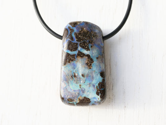 Chunky boulder opal pendant on black neoprene cord with sterling silver clasp.
