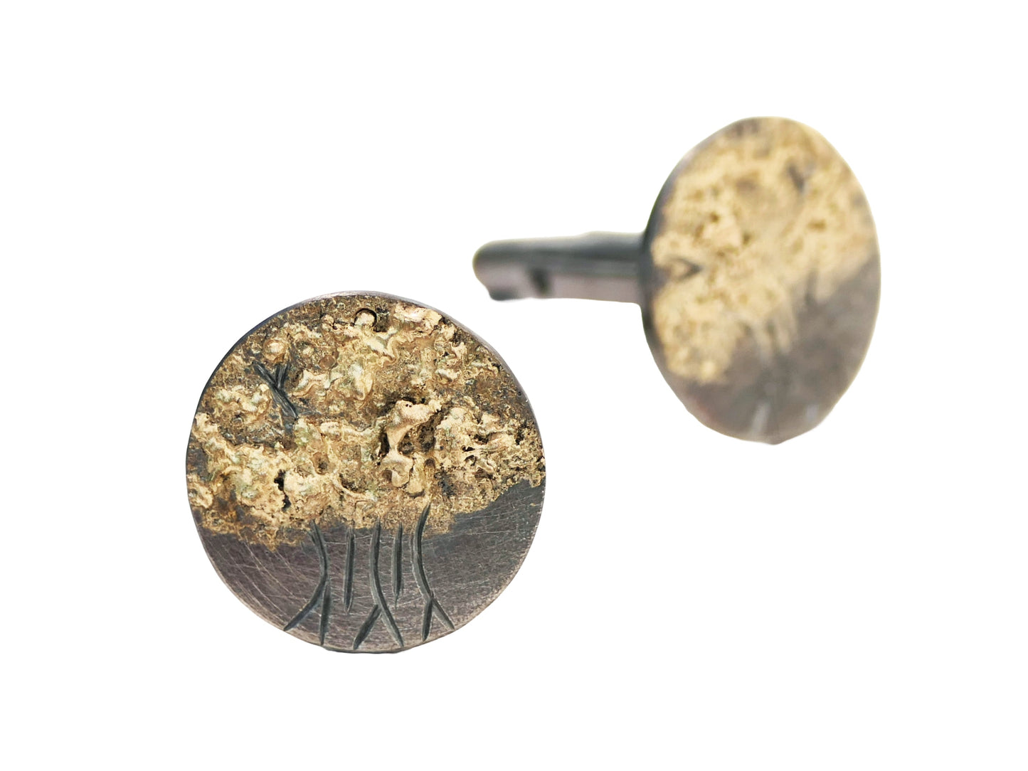 Hand engraved tree of life cufflinks in darkened silver with molten 14k gold accents, unique and handcrafted.