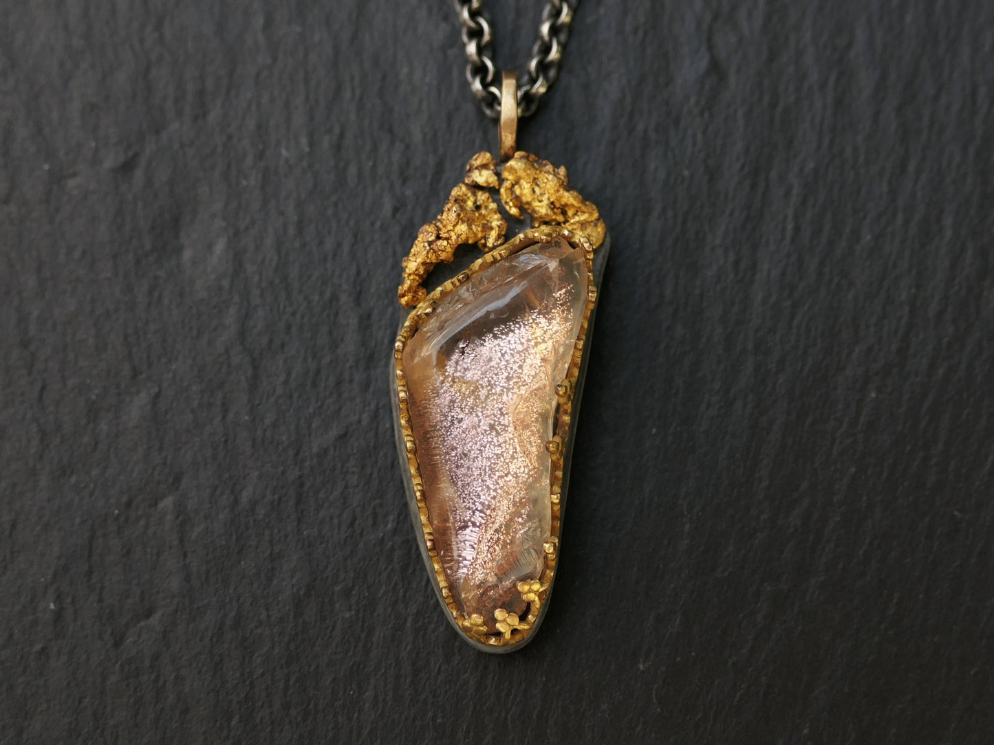 Oregon sunstone pendant with peach schiller set in 14k gold and natural gold nuggets on darkened sterling silver chain
