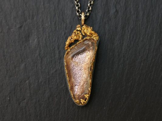 Oregon sunstone pendant with peach schiller set in 14k gold and natural gold nuggets on darkened sterling silver chain