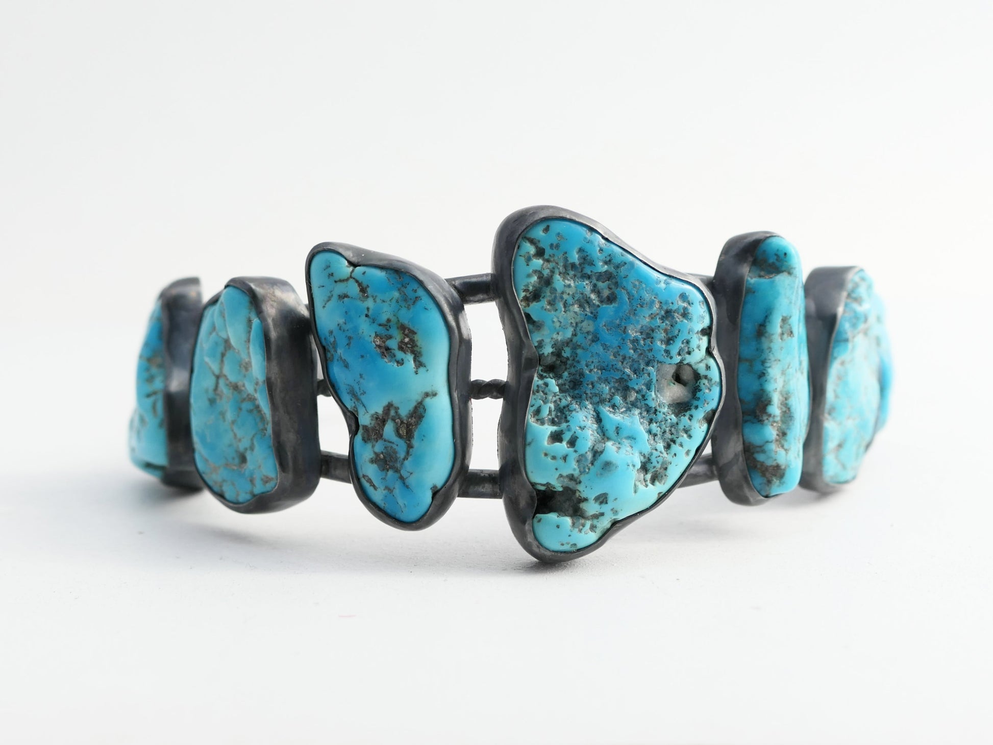 Large turquoise nugget bracelet with sterling silver cuff and Kingman gemstones.