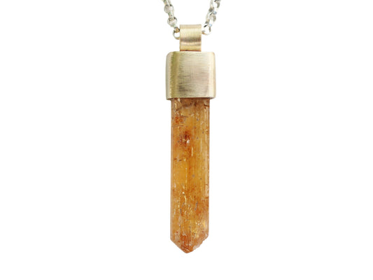 Large Imperial Topaz crystal pendant in 14k gold with sterling silver chain.