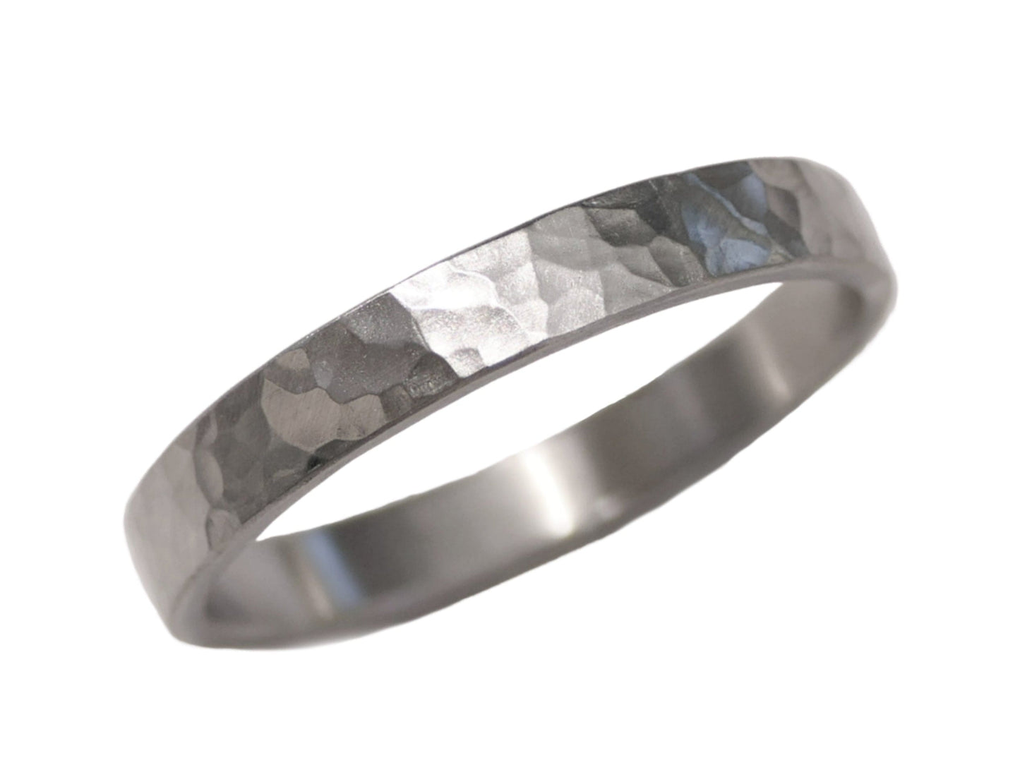 hammered solid 950 platinum wedding band with brushed matte finish and organic texture
