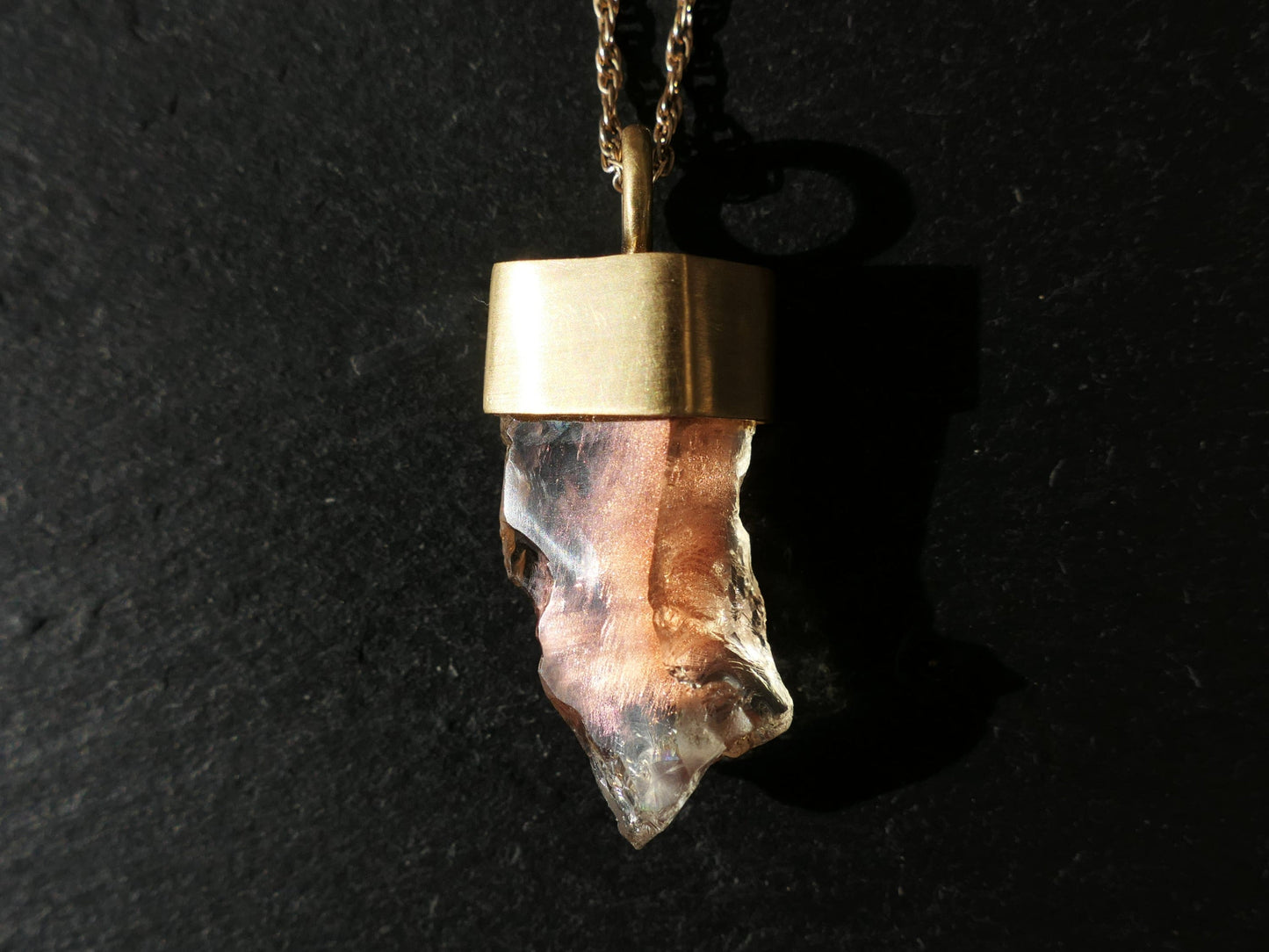 Peach schiller Oregon sunstone pendant in 18k gold with rope chain.