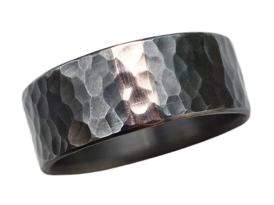 Hammered dark silver handmade wedding band with 14k rose gold inlay and rustic texture
