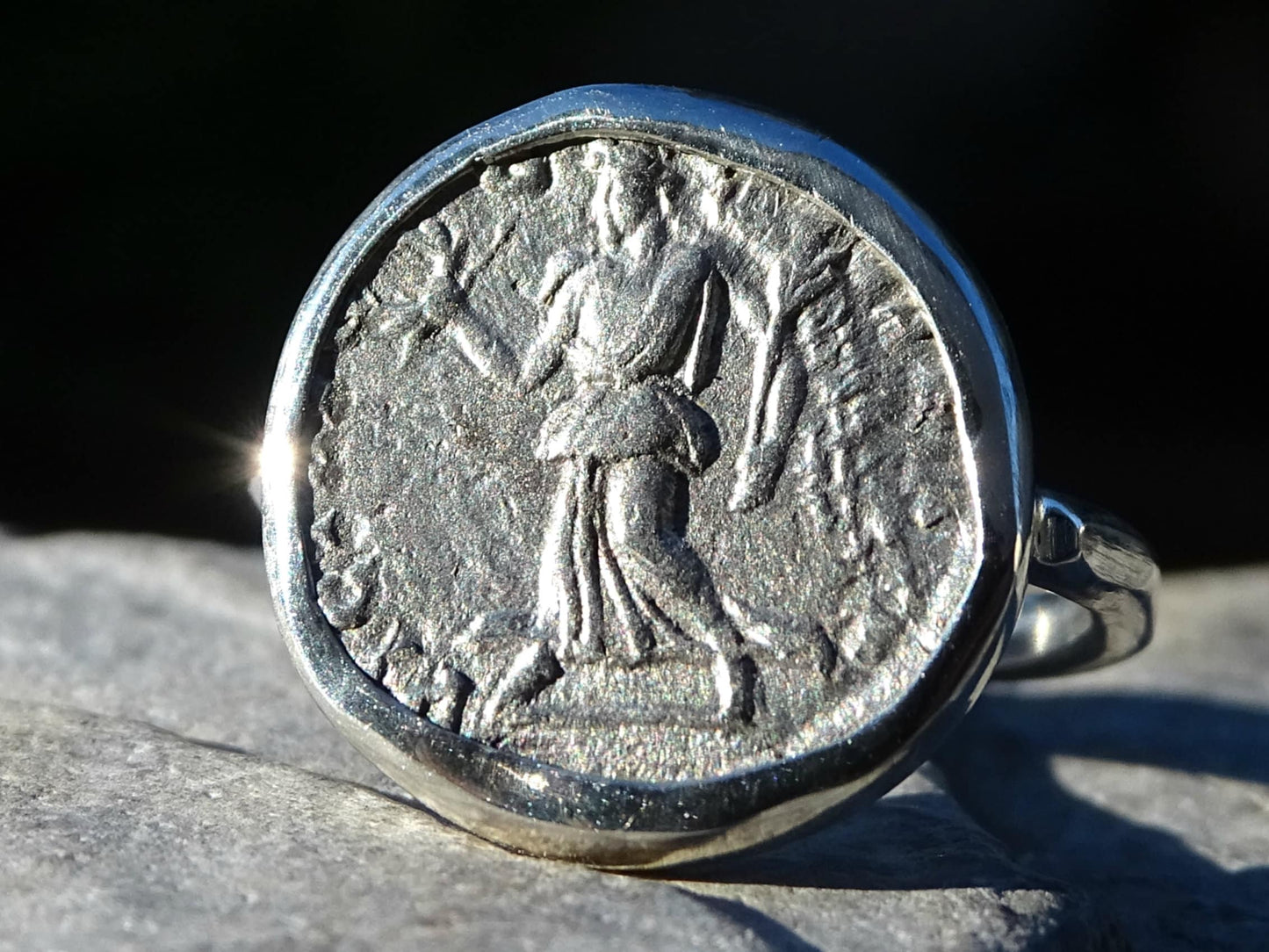 Sterling silver coin ring featuring ancient Roman coin with goddess Victoria and Emperor Septimius Severus bust