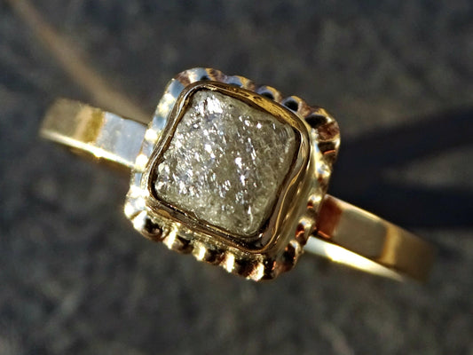 14k yellow gold diamond ring with a 1.42 carat dark grey diamond cube in a rustic bezel setting, minimalist modern design