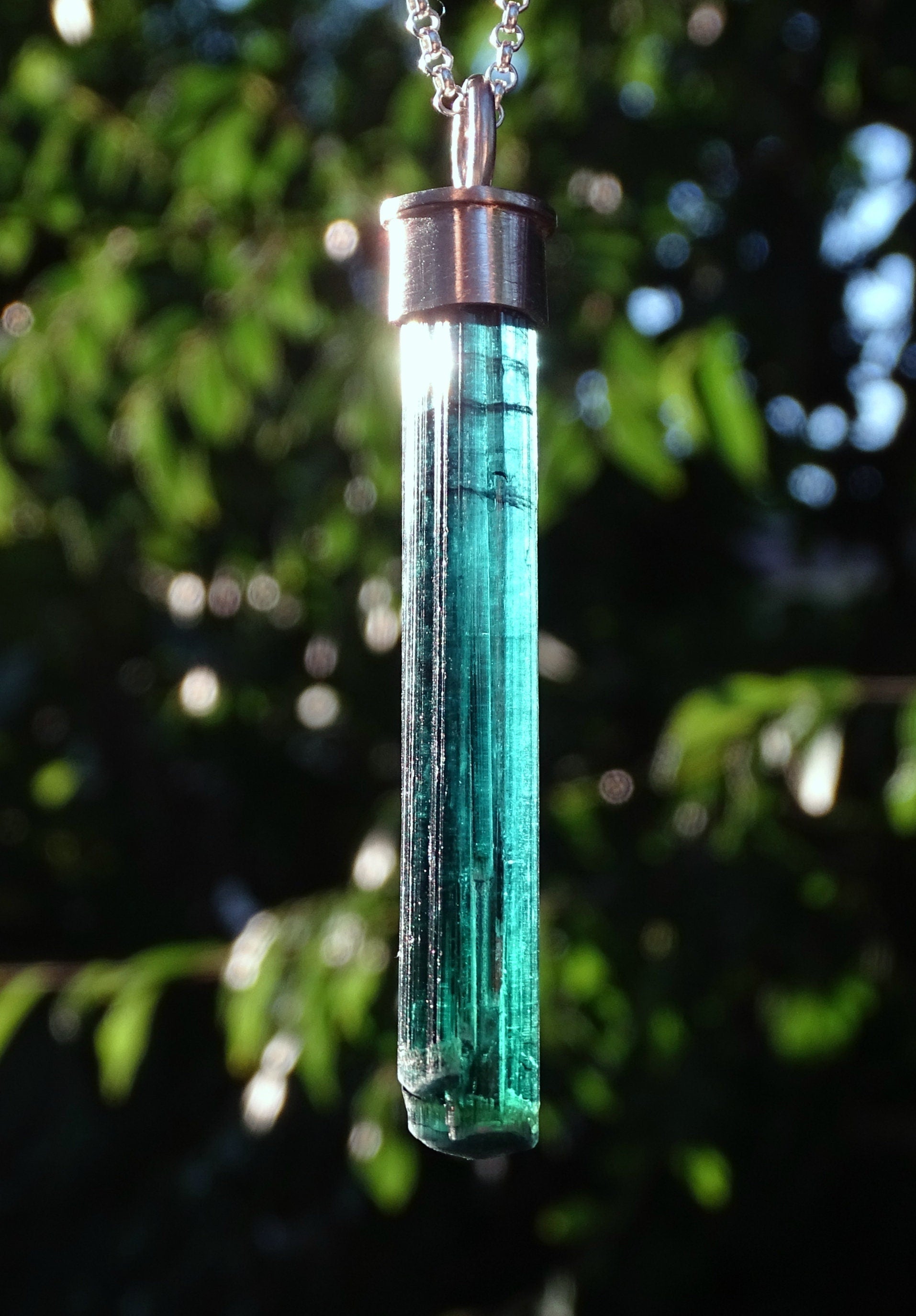 large indicolite tourmaline crystal pendant in 14k white gold with sterling silver chain
