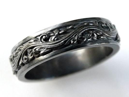 floral sculpted sterling silver eternity ring with black oxidized finish and detailed leaf pattern
